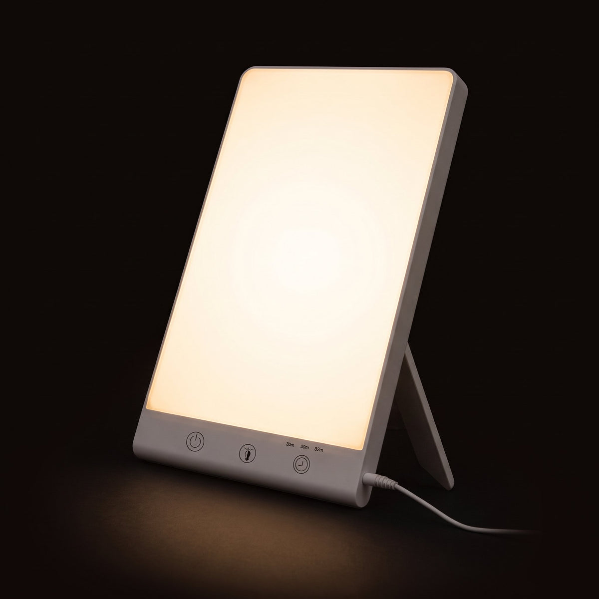 Lampe de luminothérapie allumée sur fond sombre