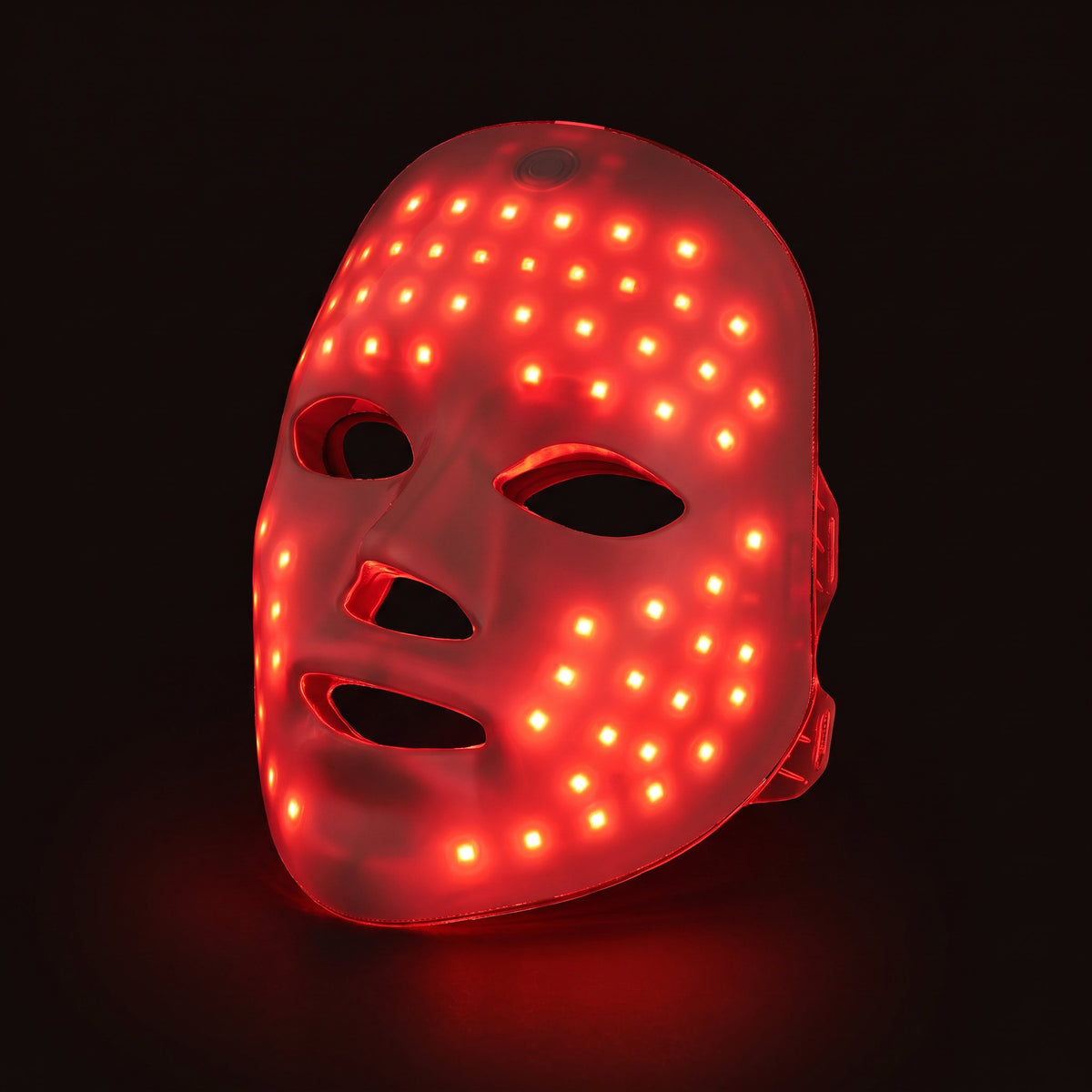 Masque LED visage rigide blanc, en fonctionnement, sur fond sombre