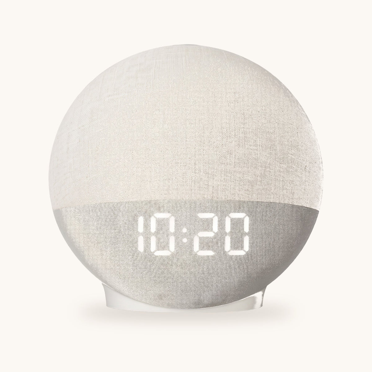 Réveil simulateur d'aube rond, globe en tissu et socle gris, vue de face sur fond ivoire